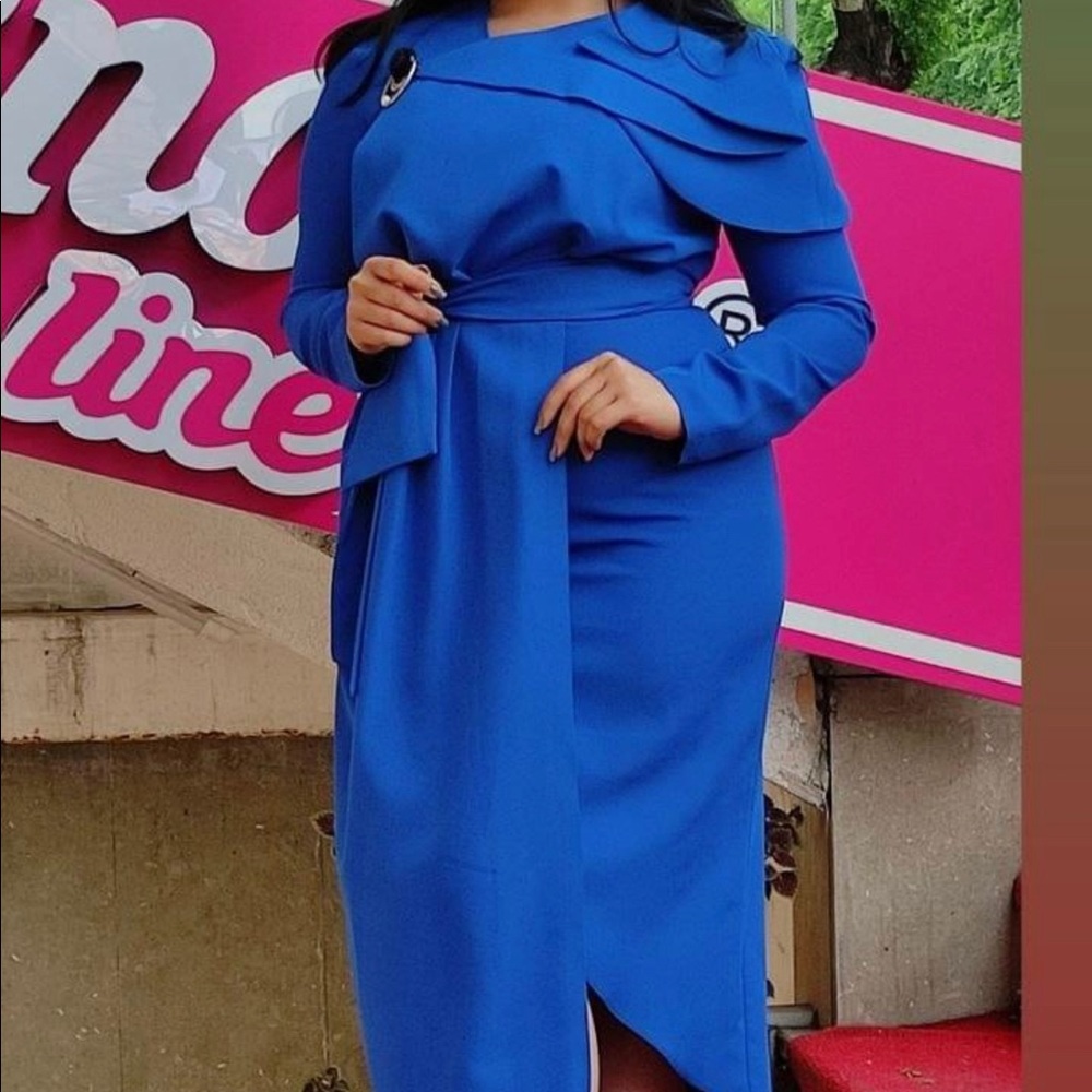 Blue dress with belt and brooch. Quality Turkey dress, size 16 available